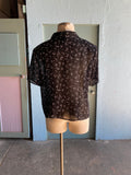 90's Sheer black button down shirt with a white curly scribble print