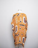 1990's Sandstone, Rust & ivory abstract printed mini caftan dress with a fringe hem