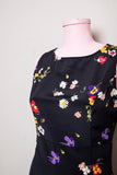 1990's Black mini sleeveless dress with red, purple, yellow & white wild flowers print
