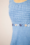 1990's Denim baby doll sleeveless mini dress with a smock bodice and daisy appliques