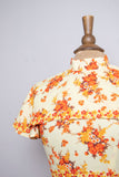 1970's Yellow floral mini dress with attached layered capelet