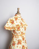 1970's Yellow floral mini dress with attached layered capelet