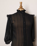 1970's Sheer striped Black Victorian style blouse, with a high ruffled collar, ruffled bib and puff sleeves.