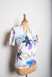 1970-80's White short sleeve button down with red, blue & purple tropical floral print