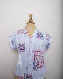 1980-90's Sky Blue short sleeve button down shirt with a floral red, blue and white quilt patchwork print
