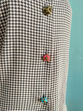 90’s Pink & black houndstooth shirt with bedazzled buttons.