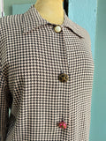 90’s Pink & black houndstooth shirt with bedazzled buttons.