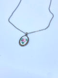 Silver necklace with small rose pendant