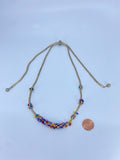 Gold tone hippie boho necklace with multi color tiny beads