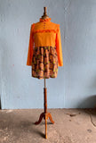 70's Orange mini with a brown, green & orange patches print skirt