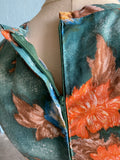 70's Dark green maxi dress with orange, blue and brown florals