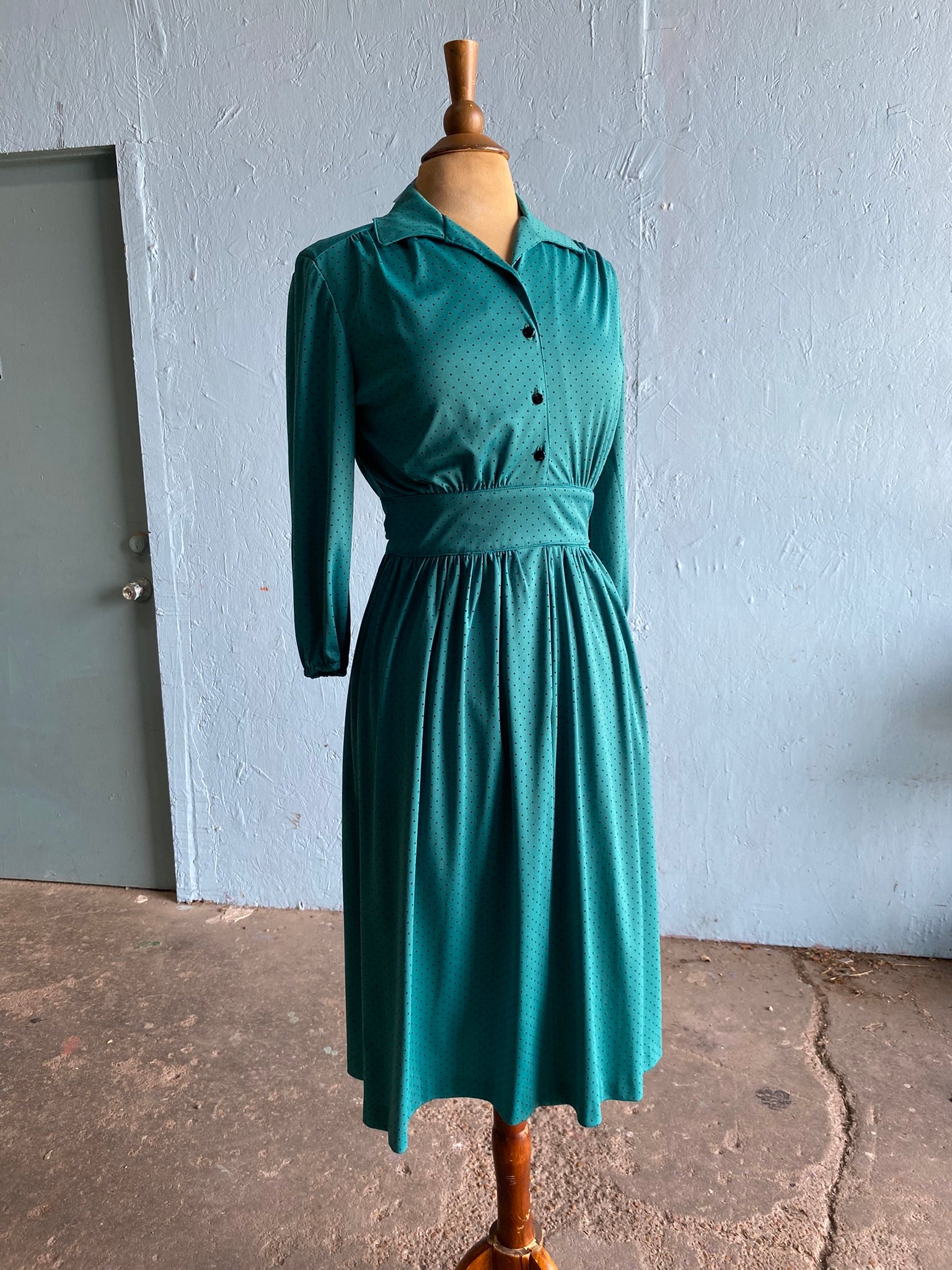 70-80's Green polka dot faux wrap dress Vida Antigua Collective 70-80's Green polka dot faux wrap dress Vida Antigua Collective
