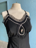 50-60's Black slip dress with silver and pink trim and embellishments