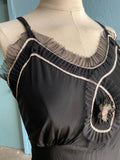 50-60's Black slip dress with silver and pink trim and embellishments