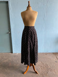 90's Black button down maxi skirt with a white polka dot & bow print