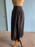 90's Black button down maxi skirt with a white polka dot & bow print