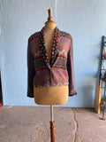 90's cropped jacket in a blocked patchwork Moroccan floral print.