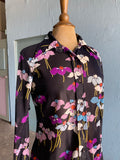 70's Black polyester long sleeve in a purple, turquoise floral print