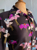 70's Black polyester long sleeve in a purple, turquoise floral print