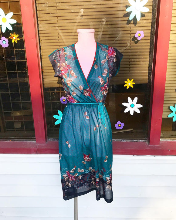 1970äó»s Sheer Teal floral dress w/an elastic waistband with a string belt. 䁣