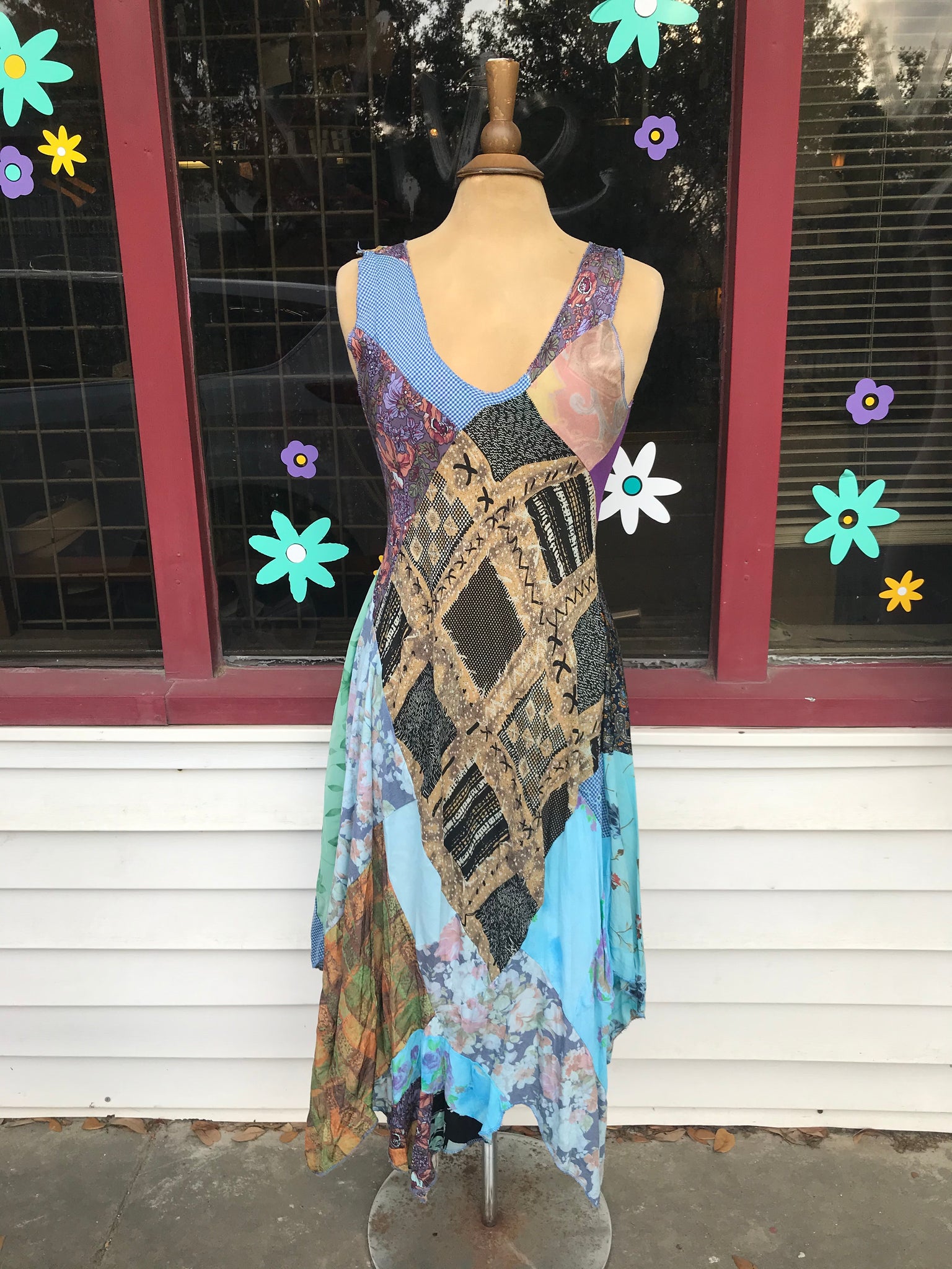 Patchwork bias cut Dress w/a handkerchief hem line. Vida Antigua Collective Patchwork bias cut Dress w/a handkerchief hem line. Vida Antigua Collective