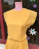 1970's Yellow button up Romper.