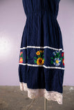 Classic Central American crinkle gauze sundress with tie shoulders with embroidered flowers