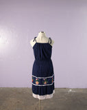 Classic Central American crinkle gauze sundress with tie shoulders with embroidered flowers