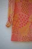 1960/1970's Orange & Pink polka dot min mod dress with sheer long sleeves