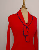 1970's Red ribbed V-neck top with navy blue lettuce trim & tie bow tie