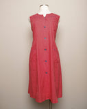 1970's Red & white polka dot sleeveless mod dress with navy trim & buttons with pockets