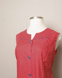 1970's Red & white polka dot sleeveless mod dress with navy trim & buttons with pockets