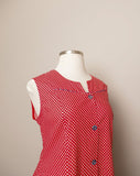 1970's Red & white polka dot sleeveless mod dress with navy trim & buttons with pockets