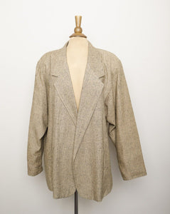 1980's ivory with black thread blazer with no buttons and shoulder pads.