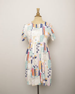 1990's Ivory baby doll dress with multi color abstract color block & sketch doodle print