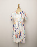 1990's Ivory baby doll dress with multi color abstract color block & sketch doodle print