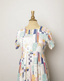 1990's Ivory baby doll dress with multi color abstract color block & sketch doodle print