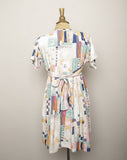 1990's Ivory baby doll dress with multi color abstract color block & sketch doodle print