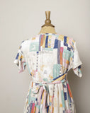 1990's Ivory baby doll dress with multi color abstract color block & sketch doodle print