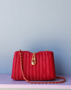 Red Wicker Purse w/gold chain shoulder strap.