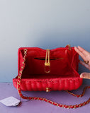 Red Wicker Purse w/gold chain shoulder strap.