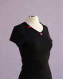 Y2K Black jersey knit body con dress with red lip side buttons