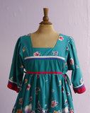 1990's Teal green floral house dress with adjustable side ties.