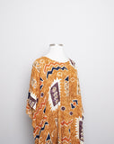 1990's Sandstone, Rust & ivory abstract printed mini caftan dress with a fringe hem