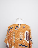 1990's Sandstone, Rust & ivory abstract printed mini caftan dress with a fringe hem