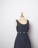 1990's Black & white polka dot sleeveless mini dress with small flower appliques