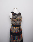 1990's Carole Little Black sleeveless dress with a striped abstract multi colored morrocan inspired print & back opening