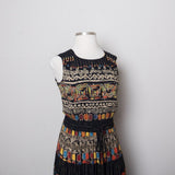 1990's Carole Little Black sleeveless dress with a striped abstract multi colored morrocan inspired print & back opening