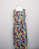 1990's Black sleeveless Plus Size dress with a primary colored flowers, back smocking & 1 pocket