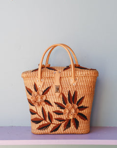 Straw Rattan tote bag embellished with a brown flowers